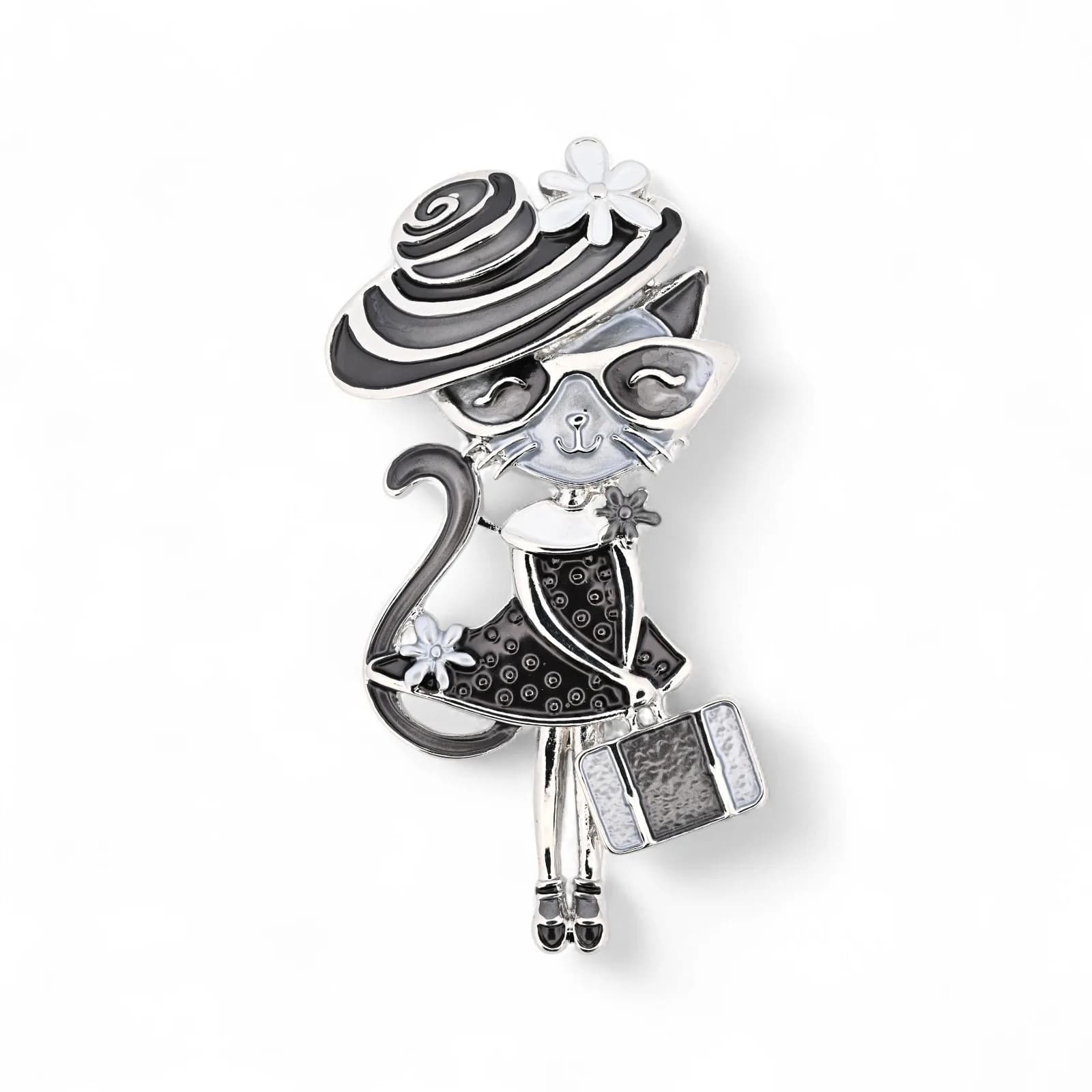 Broche chat voyageur noir et blanc avec chapeau fleuri et valise