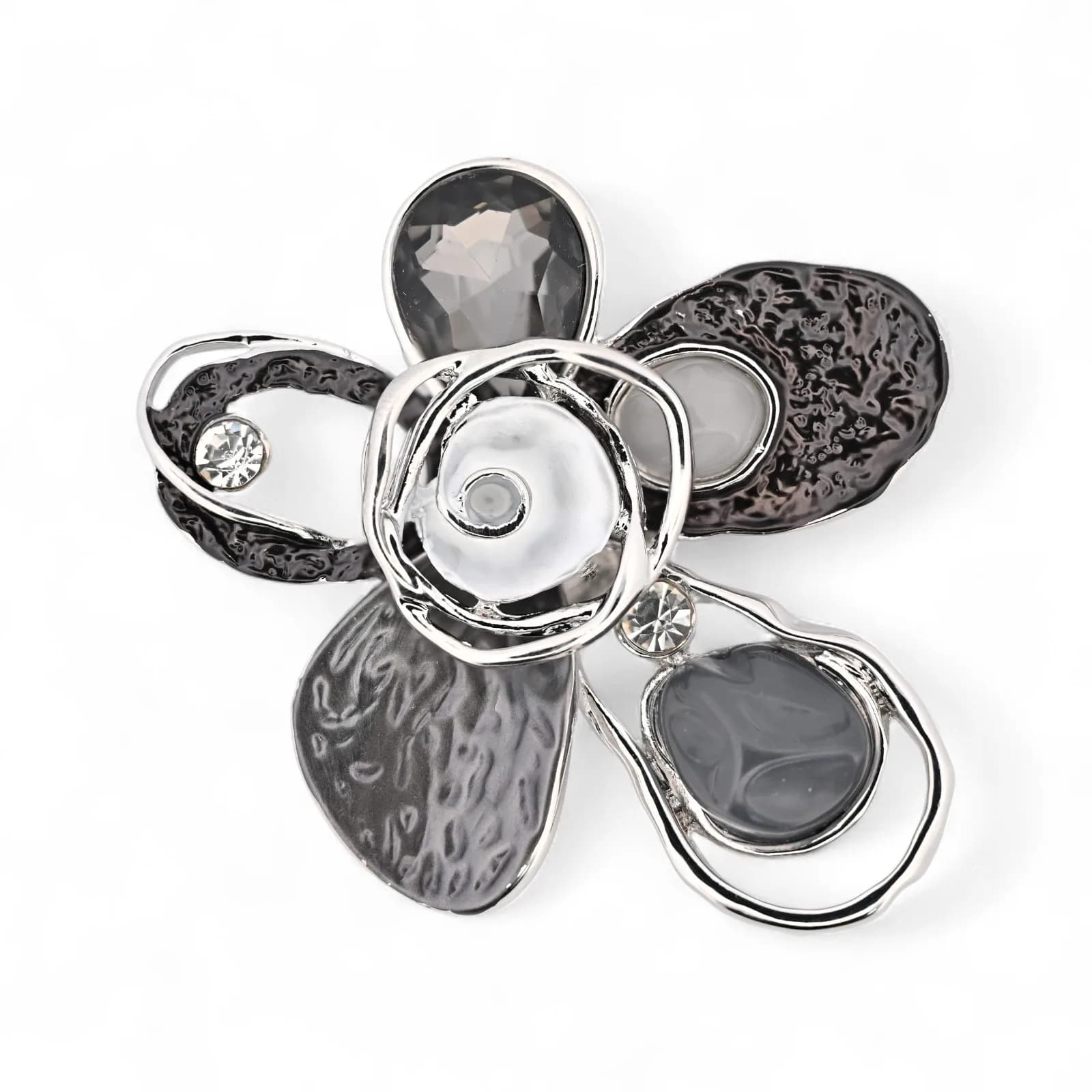 Broche fleur abstraite grise aimantée en acier argenté, vue avant